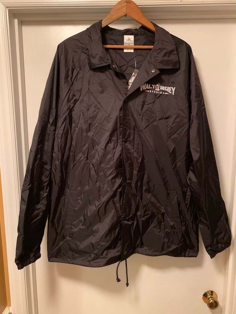 Walt Disney Studios Logo Coaches Windbreaker Jacket Black